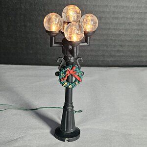 Santa's World 4 Light Little Lamp posts With Wreath Battery Operated Uses 2 AA